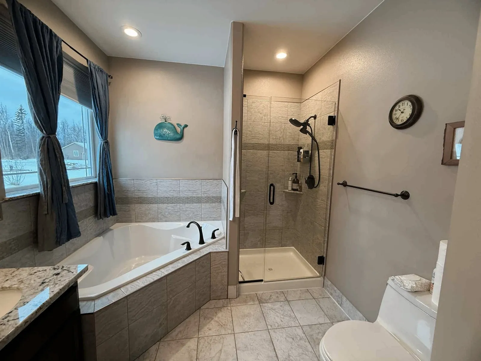 A bright, spotless bathroom suite maintained by PureMind