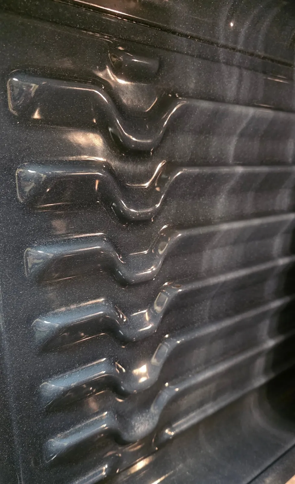 Oven racks restored to spotless after a PureMind deep clean