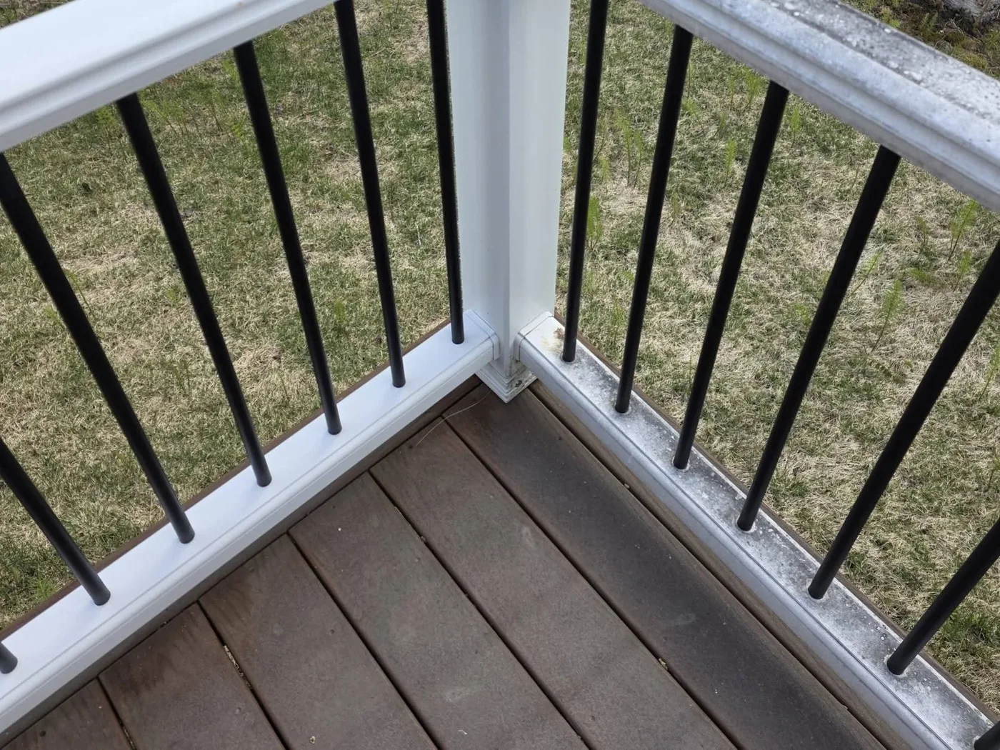 Deck railing before and after cleaning — after