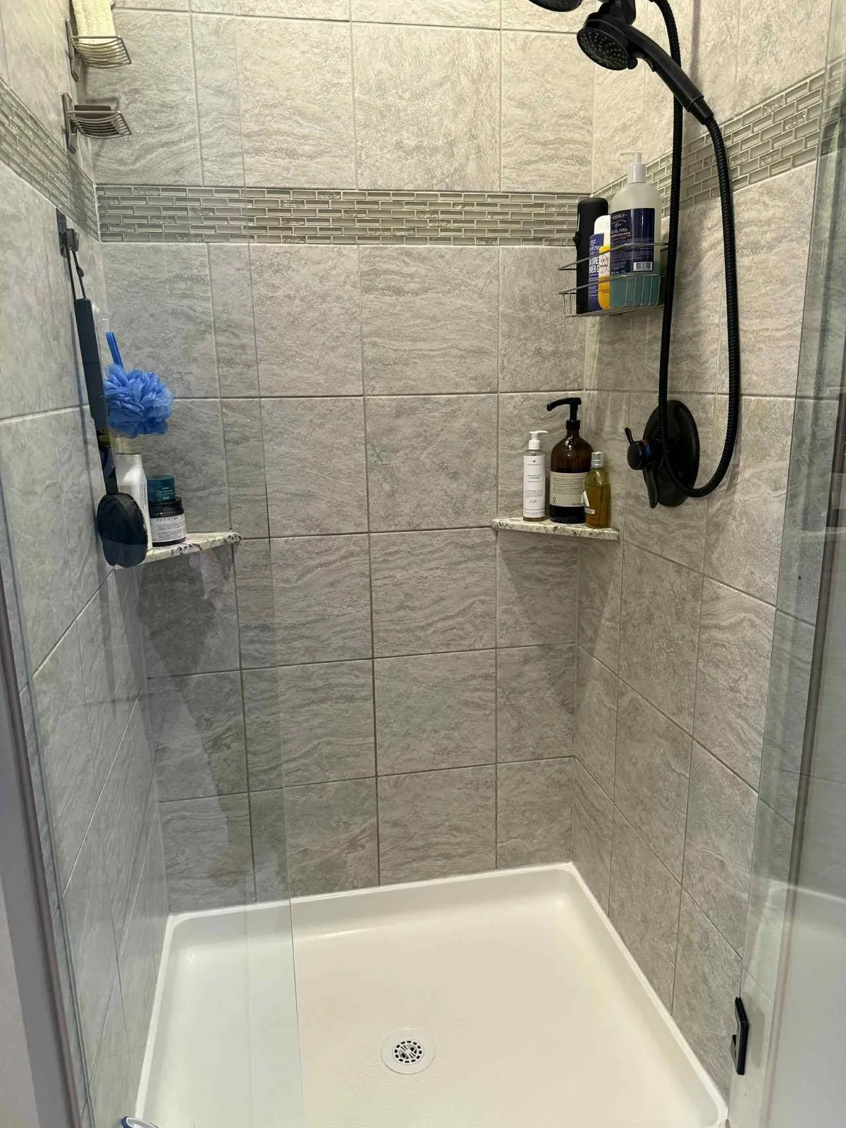 A glass shower detailed clean