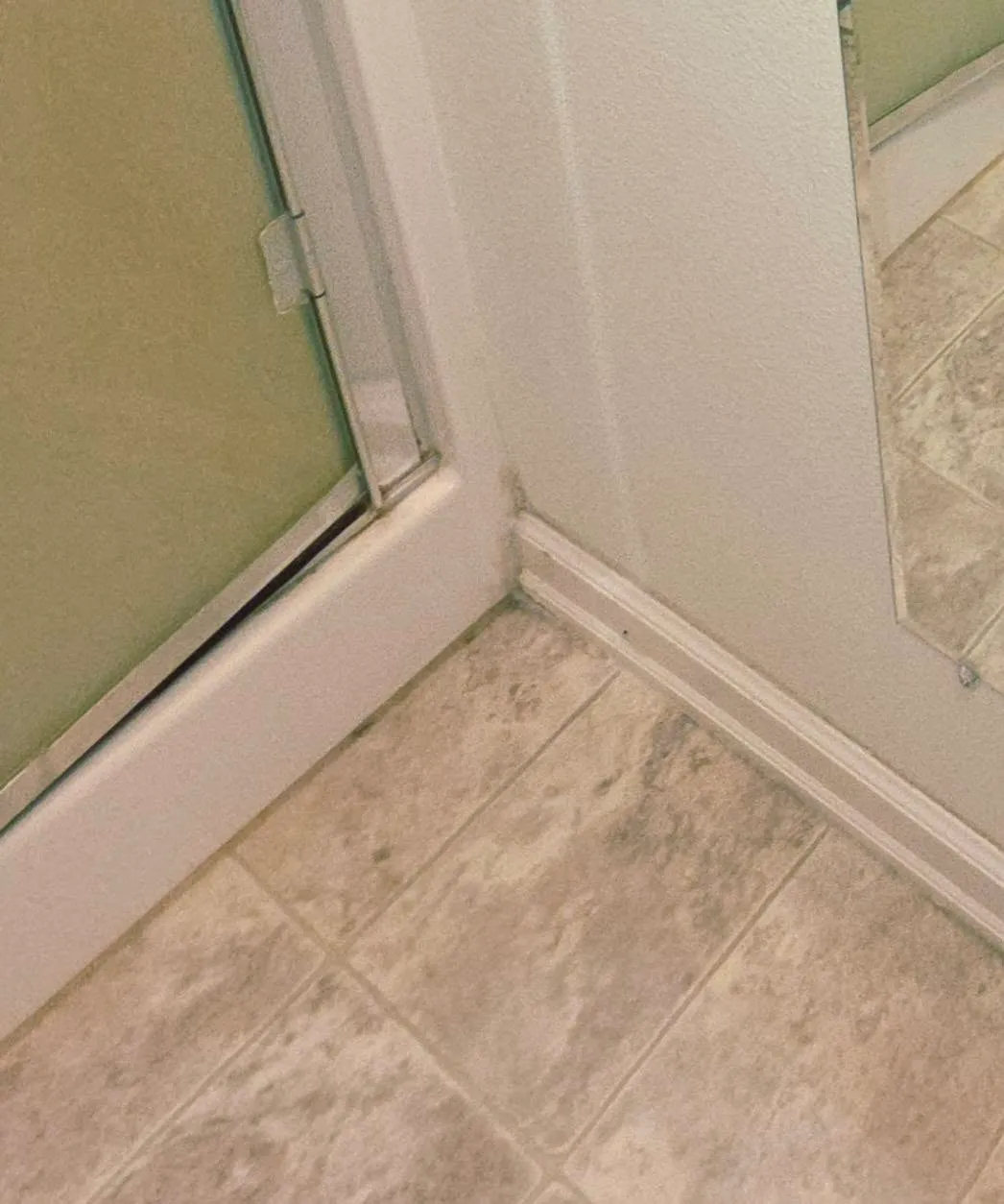 A shower door track detailed spotless