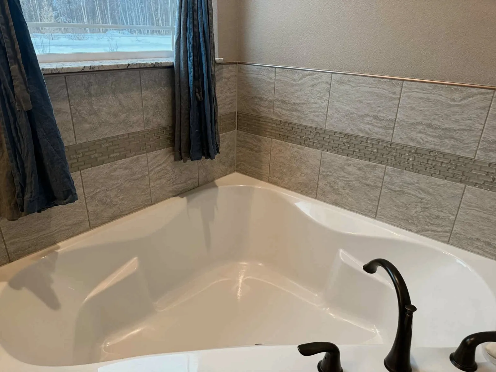 A polished garden tub faucet